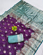 Cynosure Purple Pure Zari Weaving Banarasi Silk Saree With Engaging Blouse Piece