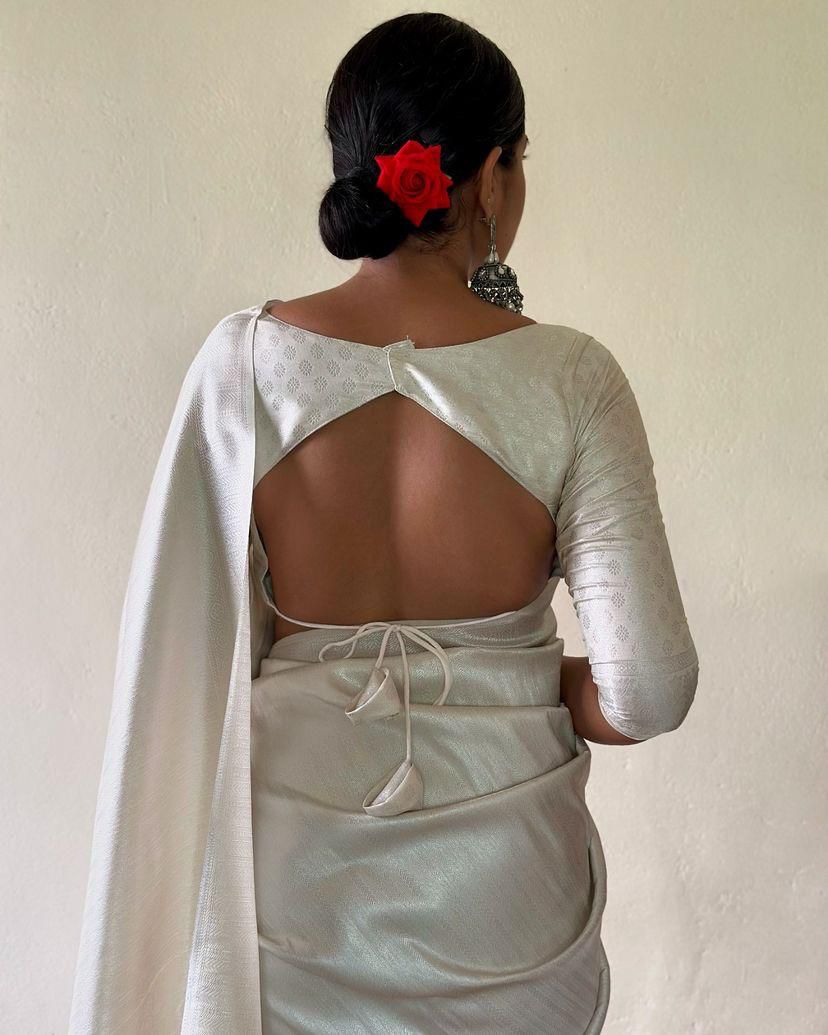 Dissemble Off White Kanjivaram Silk Saree With Radiant Blouse Piece