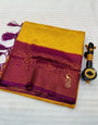 Cynosure Yellow Soft Banarasi Silk Saree With Moiety Blouse Piece