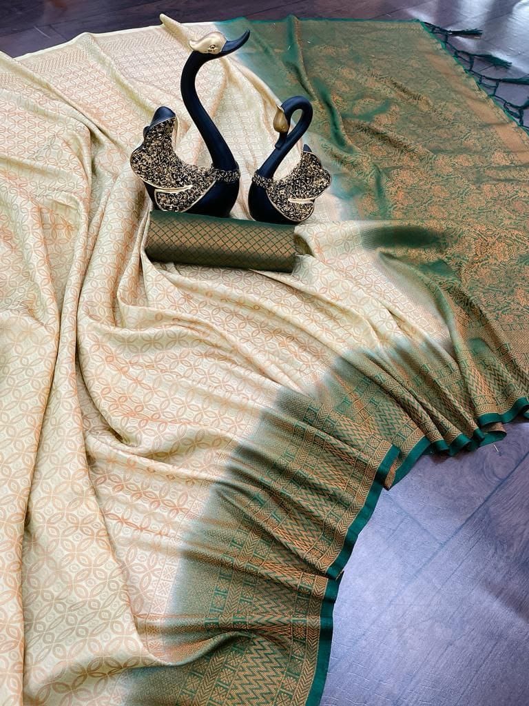 Gossamer Pista Kanjivaram Silk Saree With Beleaguer Blouse Piece