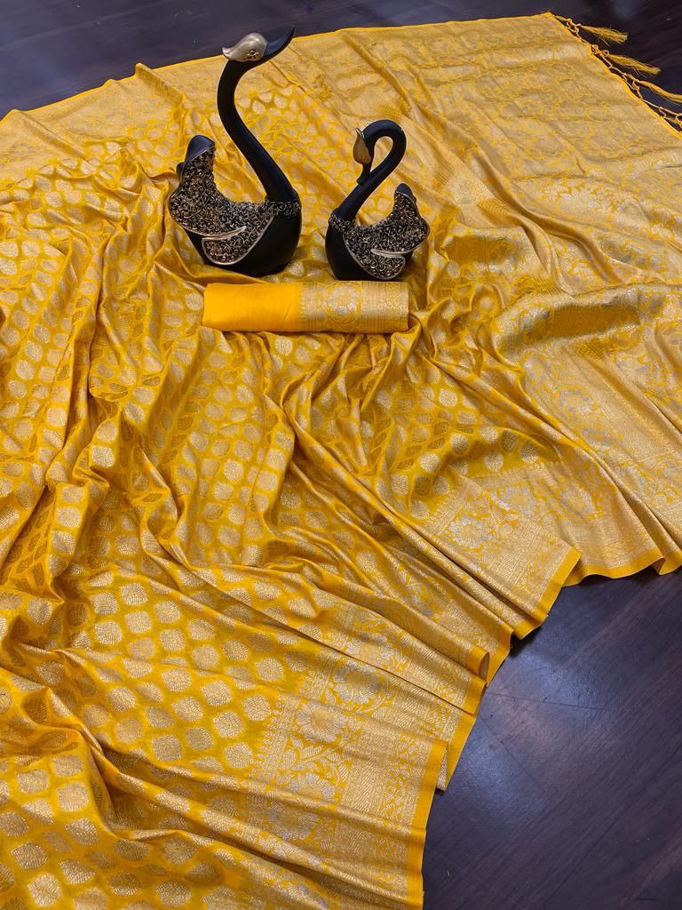 Redolent Yellow Soft Banarasi Silk Saree With Engrossing Blouse Piece