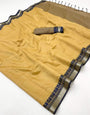 Opulent Dark Beige Cotton Silk Saree With Brood Blouse Piece