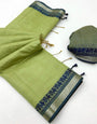 Enigmatic Pista Cotton Silk Saree With Vibrant Blouse Piece
