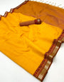 Charming Yellow Cotton Silk Saree With Sophisticated Blouse Piece