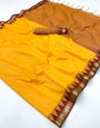 Blissful Yellow Cotton Silk Saree With Luminous Blouse Piece