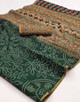 Fancifull Dark Green Printed Cotton Silk Saree With Energetic Blouse Piece