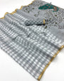 Engaging Grey Printed Cotton Silk Saree With Radiant Blouse Piece