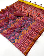 Radiant Purple Printed Patola Handloom Silk Saree With Gossamer Blouse Piece