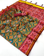 Smart Green Printed Patola Handloom Silk Saree With Entrancing Blouse Piece
