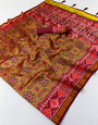 Ephemeral Mustard Printed Patola Handloom Silk Saree With Vivacious Blouse Piece
