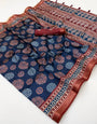 Pleasurable Navy Blue Ajrakh Printed Soft Silk Saree With Demanding Blouse Piece