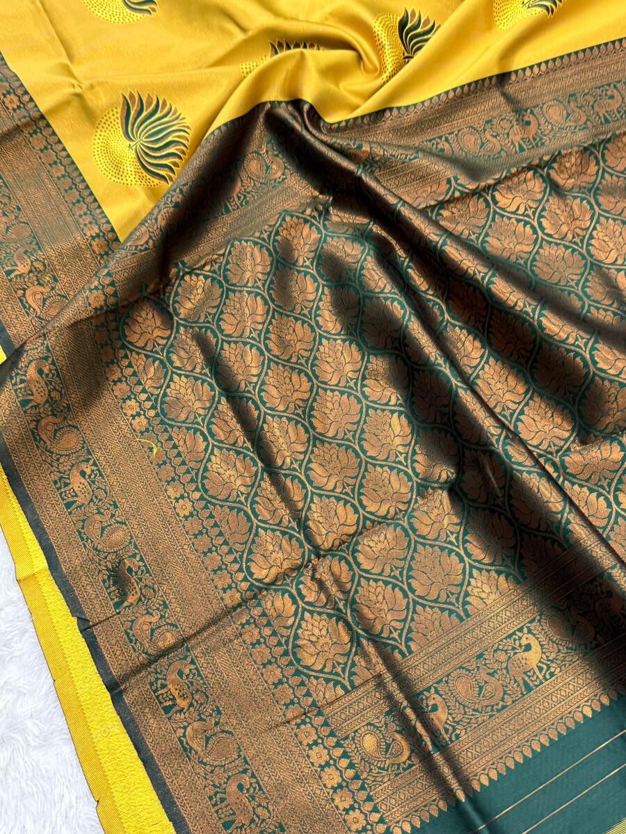 Cynosure Yellow and Green Soft Silk Saree With Artistic Blouse Piece