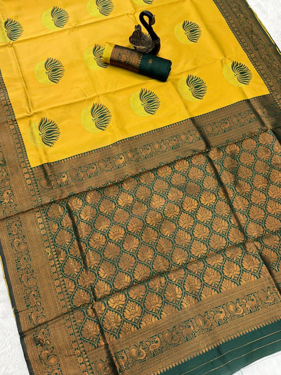 Cynosure Yellow and Green Soft Silk Saree With Artistic Blouse Piece