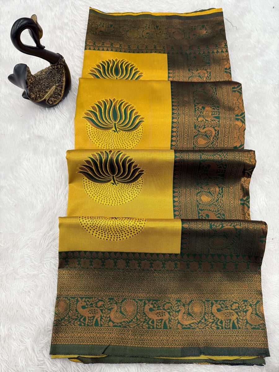 Cynosure Yellow and Green Soft Silk Saree With Artistic Blouse Piece