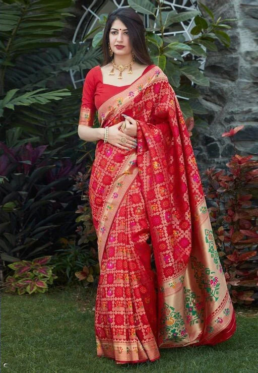 Scintillating Red Soft Banarasi Silk Saree With Redolent Blouse Piece