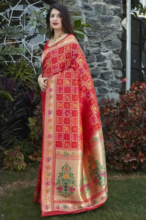 Scintillating Red Soft Banarasi Silk Saree With Redolent Blouse Piece