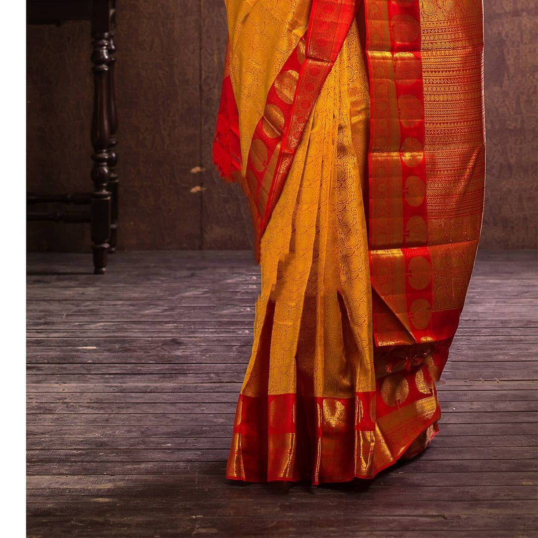 Impressive Yellow Soft Banarasi Silk Saree With Flattering Blouse Piece