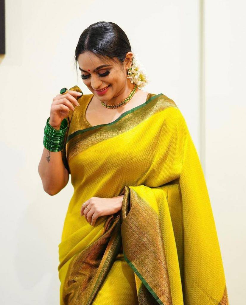 Moiety Yellow Soft Banarasi Silk Saree With Girlish Blouse Piece