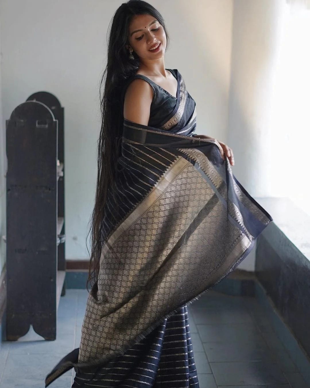 Prettiest Black Soft Banarasi Silk Saree With Flattering Blouse Piece