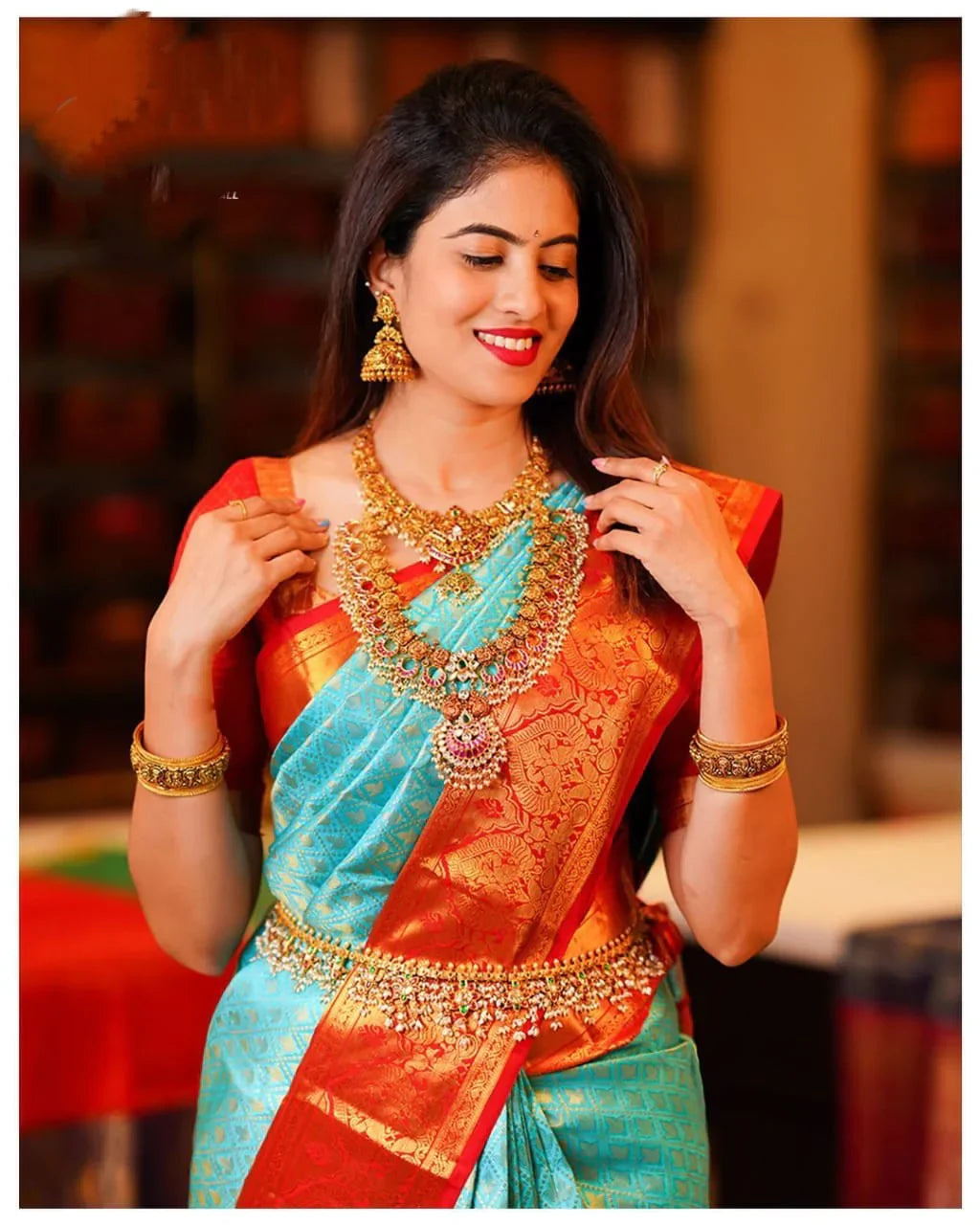 Enigmatic Turquoise Soft Silk Saree with Propinquity Blouse Piece