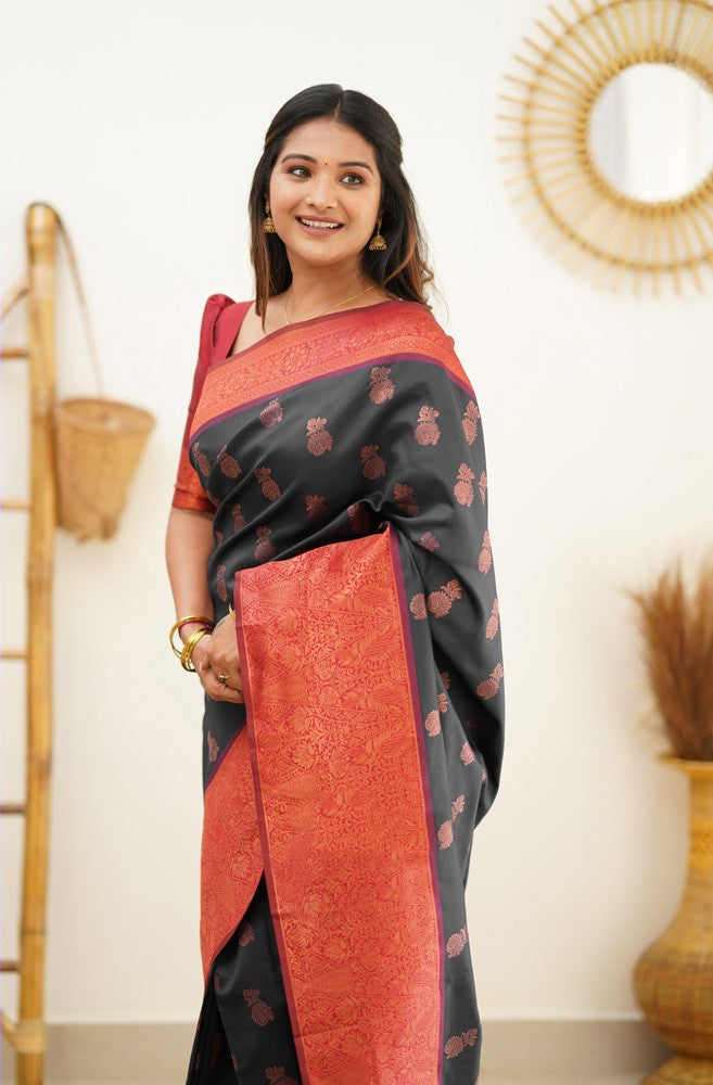 Magnetic Black Soft Banarasi Silk Saree With Luxuriant Blouse Piece