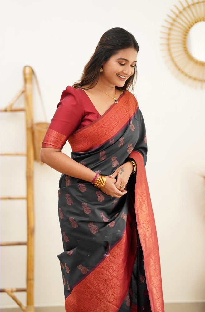 Magnetic Black Soft Banarasi Silk Saree With Luxuriant Blouse Piece