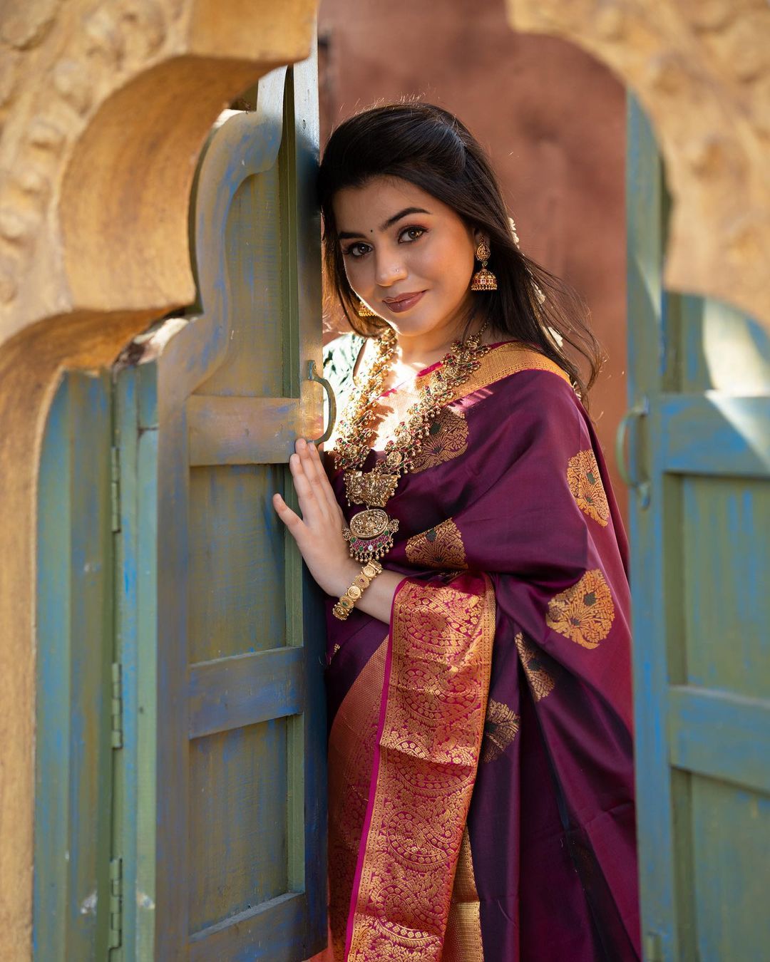 Dissemble Wine Soft Banarasi Silk Saree With Adorable Blouse Piece