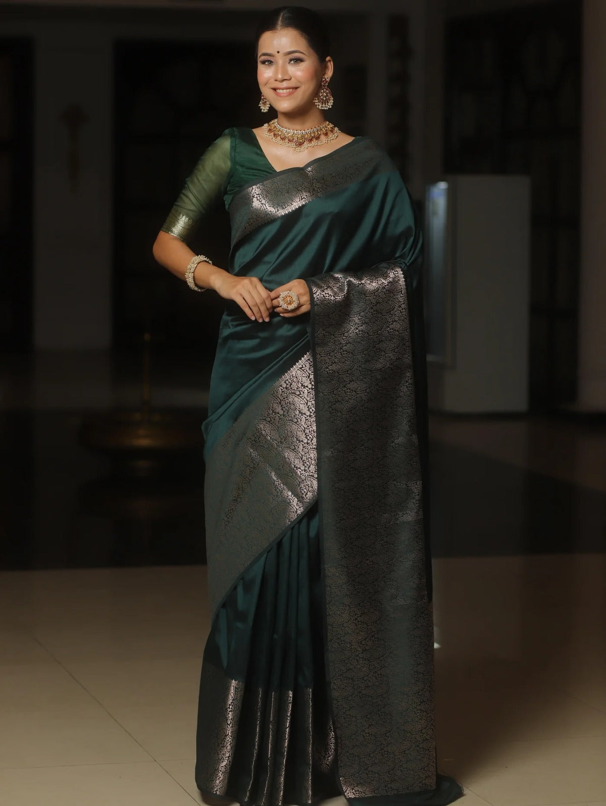 Rhapsodic Dark Green Soft Silk Saree With Lustrous Blouse Piece
