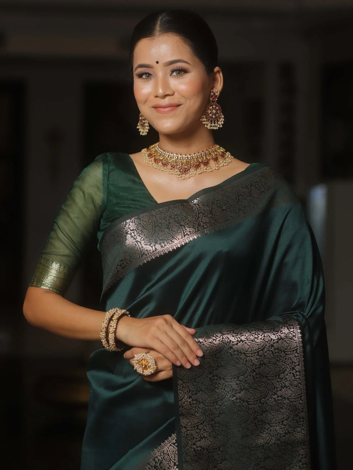 Rhapsodic Dark Green Soft Silk Saree With Lustrous Blouse Piece