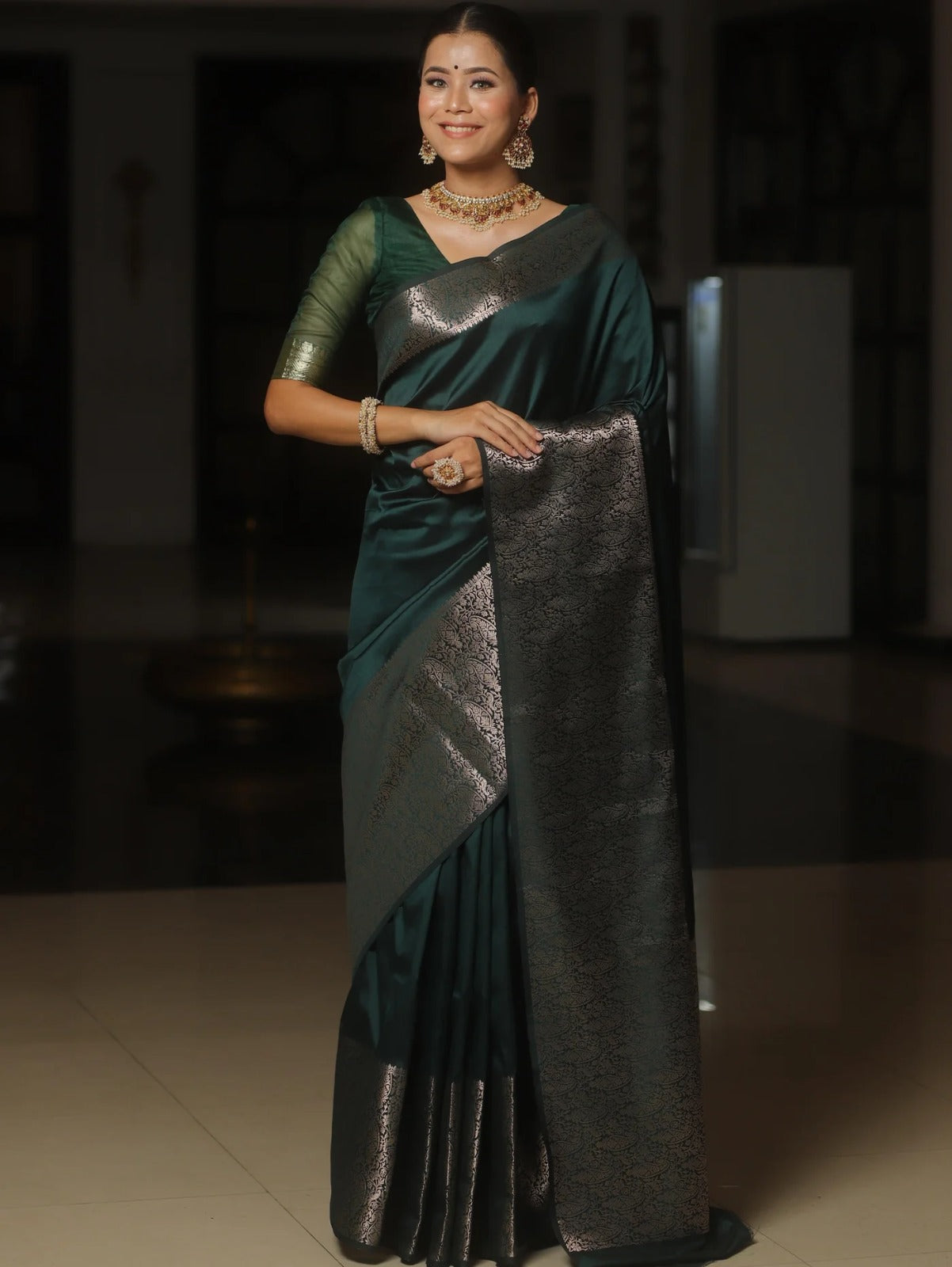 Rhapsodic Dark Green Soft Silk Saree With Lustrous Blouse Piece
