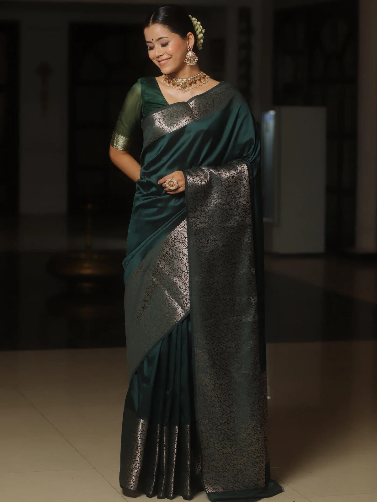 Rhapsodic Dark Green Soft Silk Saree With Lustrous Blouse Piece