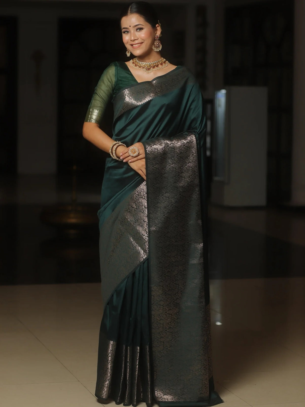 Rhapsodic Dark Green Soft Silk Saree With Lustrous Blouse Piece