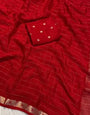 Cynosure Red Banarasi Georgette Silk Saree With Incredible Blouse Piece