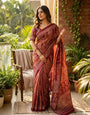 Desuetude Maroon Ajrakh Printed Mirror Work Satin Silk Saree With Blooming Blouse Piece