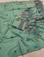 Beguiling Turquoise Pure Munga Cotton Silk Saree With Confounding Blouse Piece