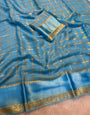 Flaunt Firozi Banarasi Viscose Silk Saree With Pleasant Blouse Piece
