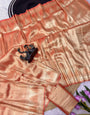 Dazzling Orange Banarasi Tissue Silk Saree With Inimitable Blouse Piece