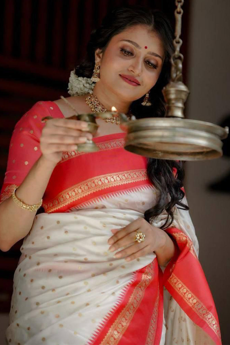 Splendorous Off White Soft Silk Saree With Inimitable Blouse Piece
