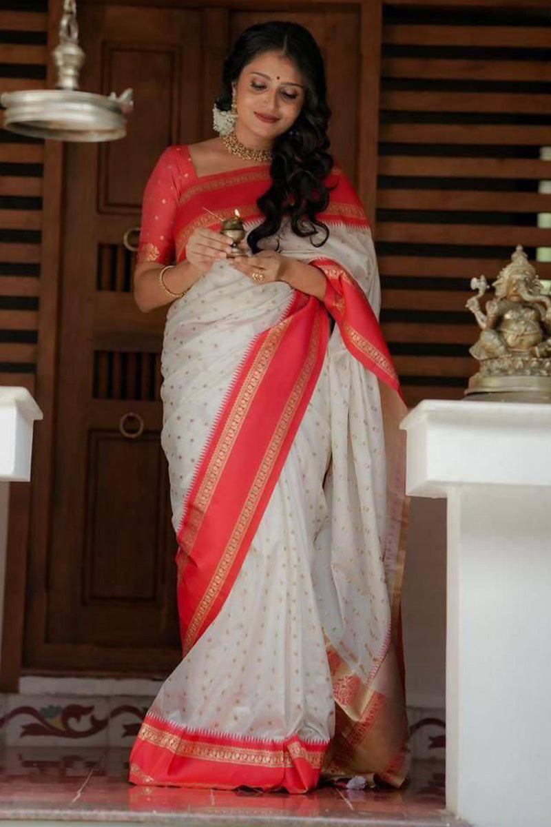 Splendorous Off White Soft Silk Saree With Inimitable Blouse Piece