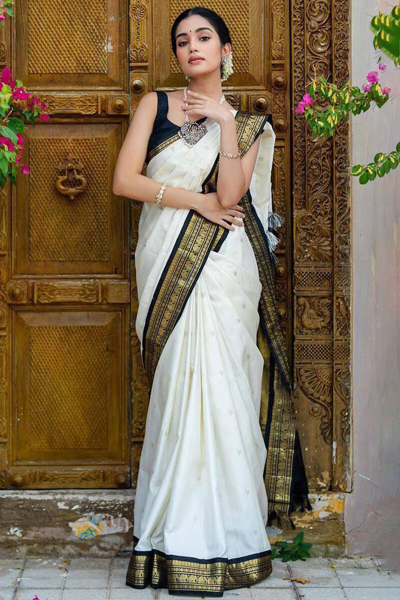 Flattering Off White Soft Silk Saree With Confounding Blouse Piece
