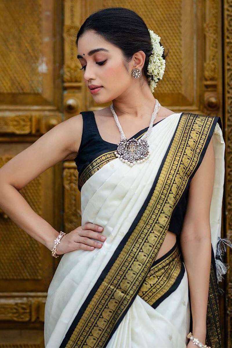 Flattering Off White Soft Silk Saree With Confounding Blouse Piece