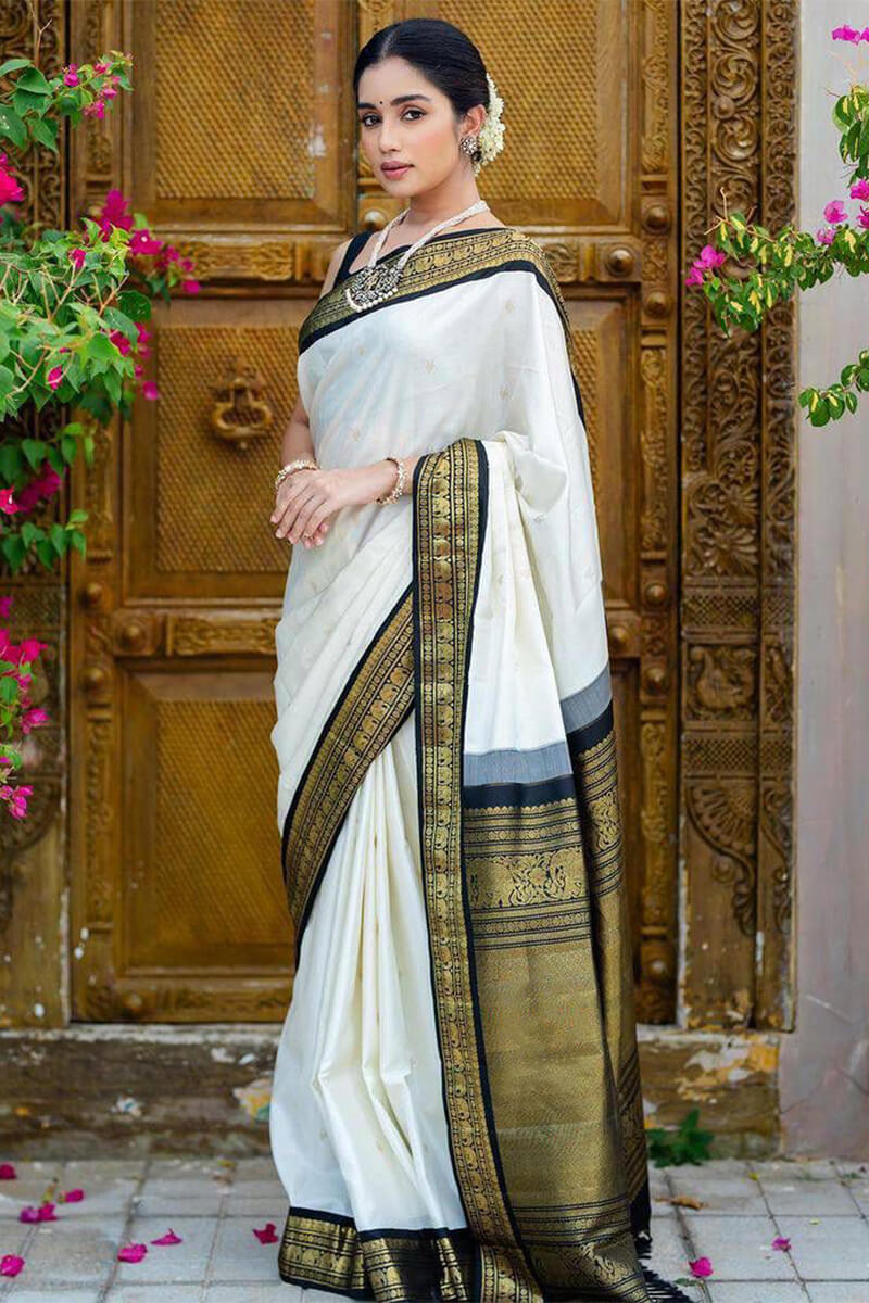 Flattering Off White Soft Silk Saree With Confounding Blouse Piece