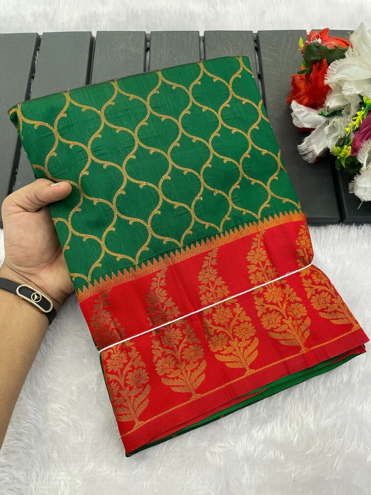 Cynosure Dark Green Soft Banarasi Silk Saree With Lagniappe Blouse Piece