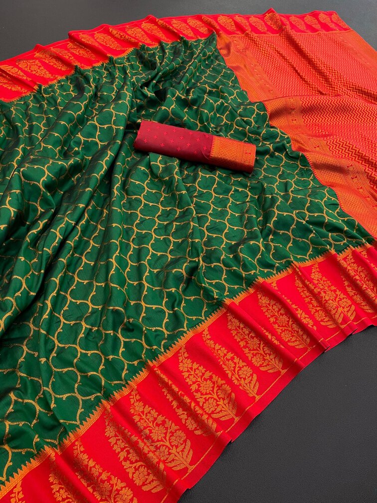 Cynosure Dark Green Soft Banarasi Silk Saree With Lagniappe Blouse Piece