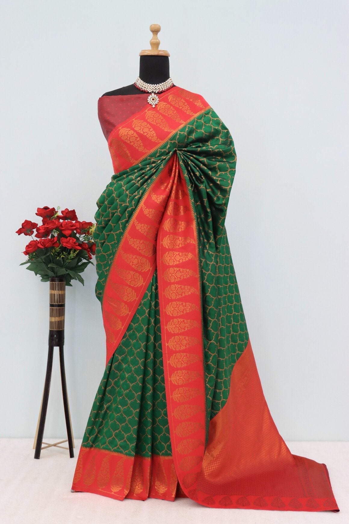 Cynosure Dark Green Soft Banarasi Silk Saree With Lagniappe Blouse Piece