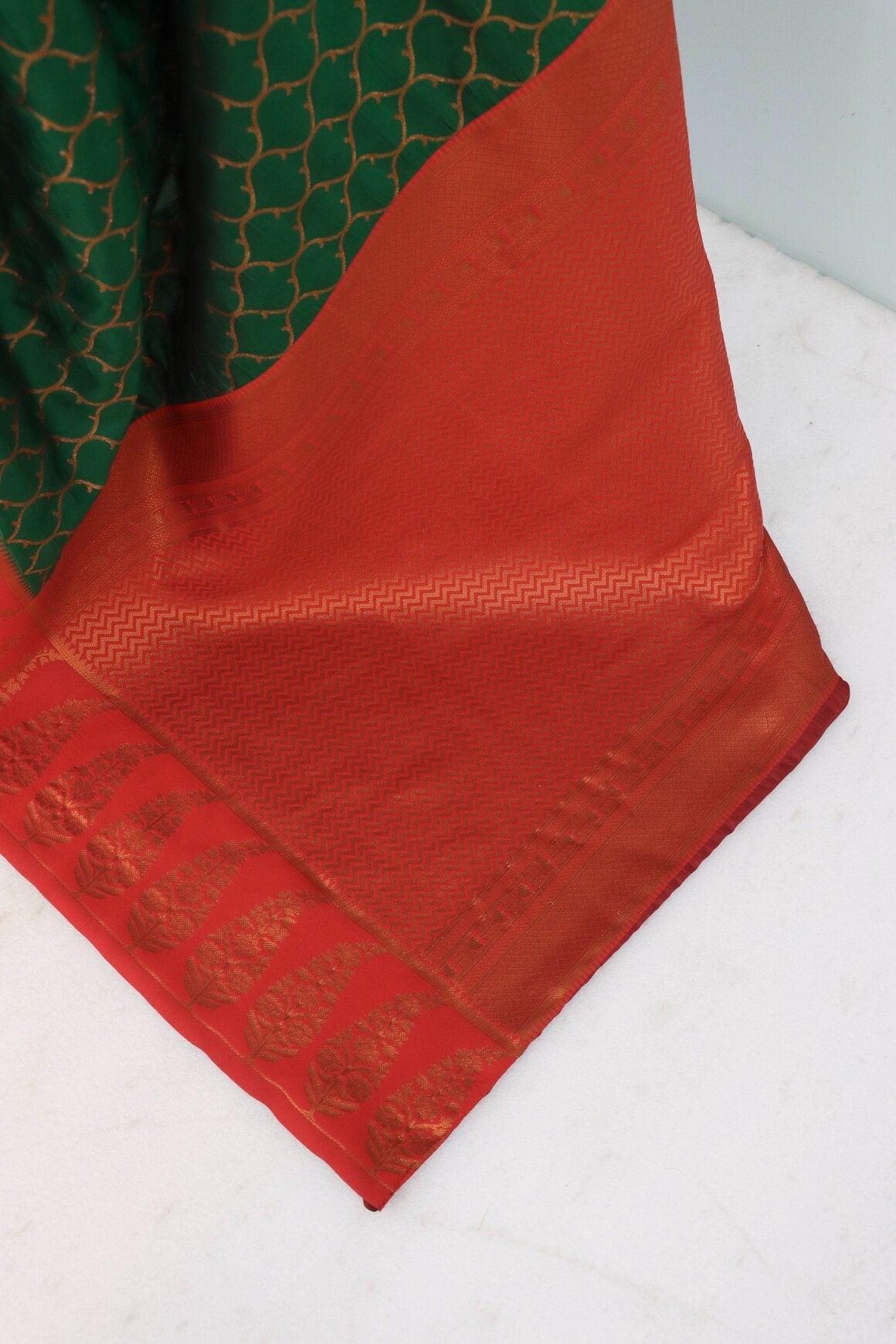 Cynosure Dark Green Soft Banarasi Silk Saree With Lagniappe Blouse Piece