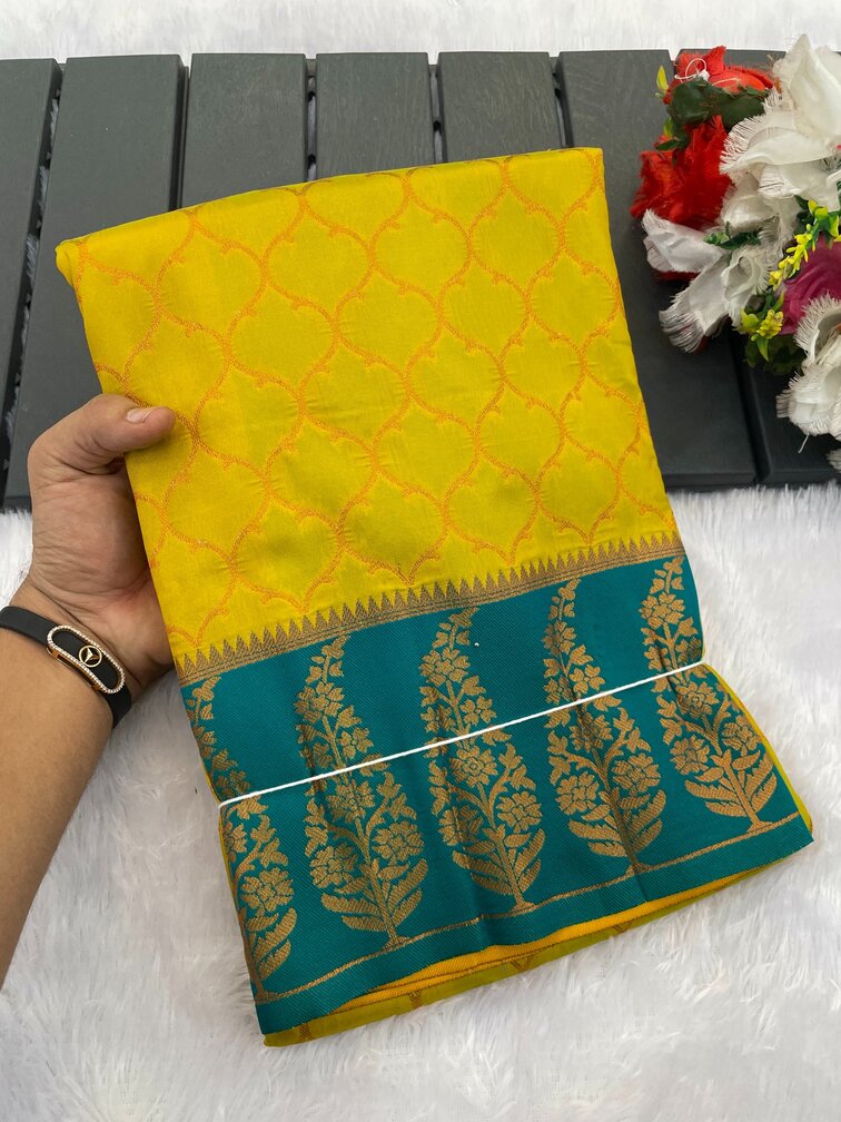 Vestigial Mustard Soft Banarasi Silk Saree With Sumptuous Blouse Piece