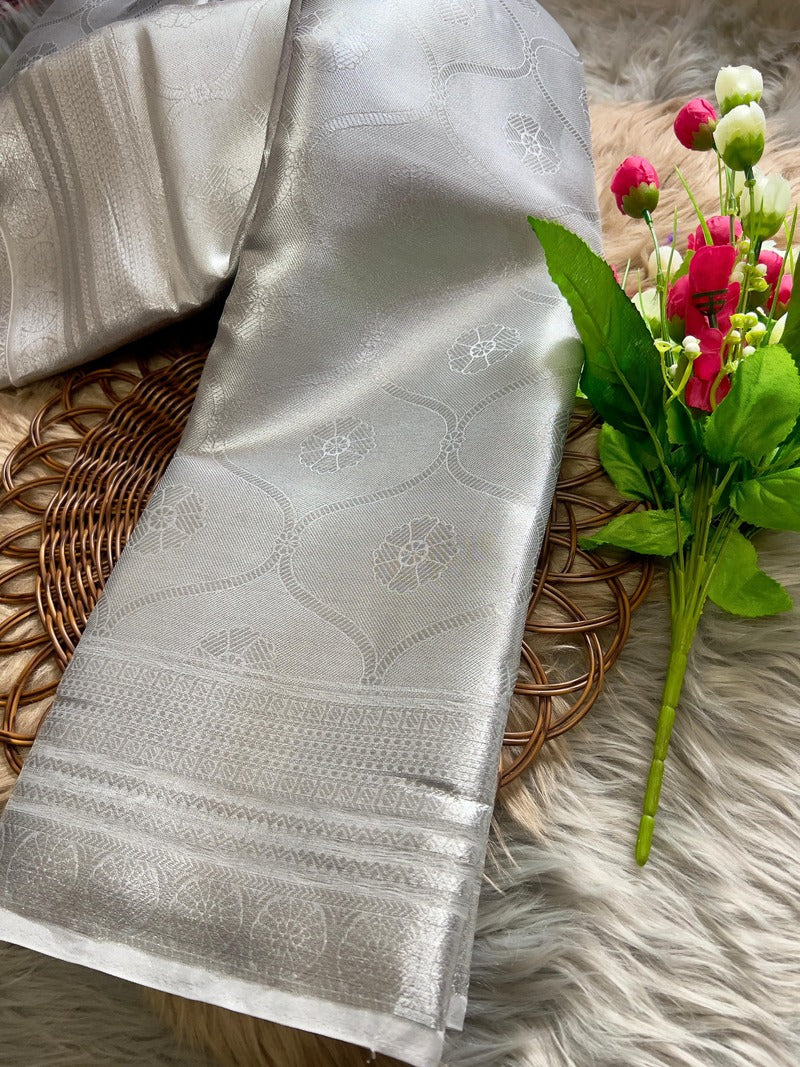 Classy Style Silver Soft Tissue Silk Saree With Pretty Blouse Piece