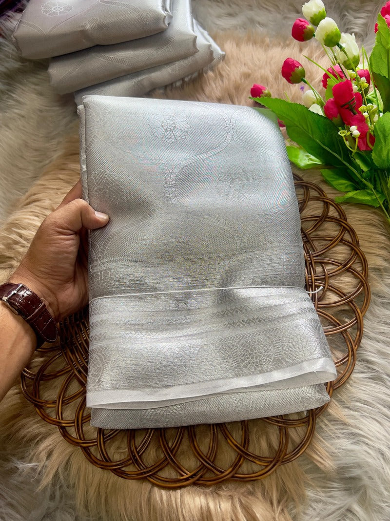 Classy Style Silver Soft Tissue Silk Saree With Pretty Blouse Piece