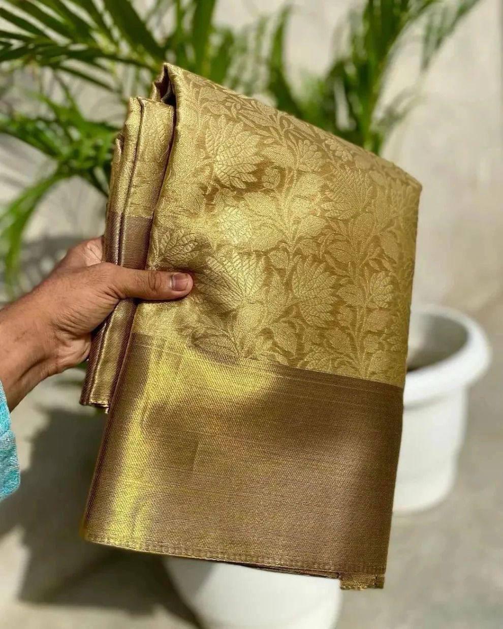 Alluring Golden Soft Tissue Silk Saree With Jazzy Blouse Piece